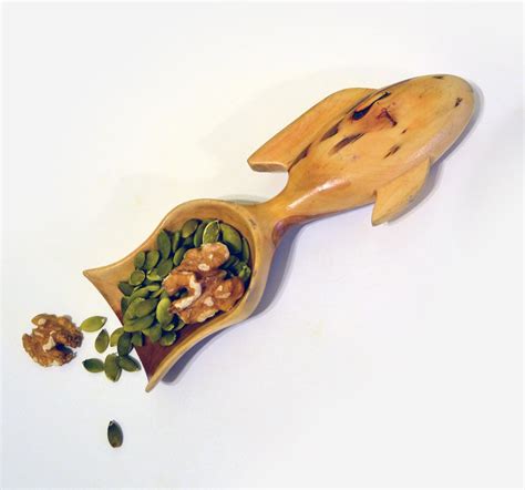 Spoonrest — a spoon rest is a piece of kitchenware that serves as a place to lay spoons and other cooking utensils , to prevent cooking fluids from getting onto countertops. fish spoon again | Spoon, Tableware, Spoon rest