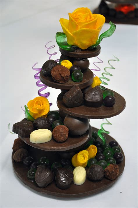 A Display Stand For Chocolates Made Out Of Chocolate Chocolate