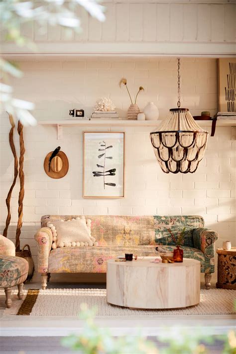 Anthropologie cuna reclaimed wood coffee table by taracea in black $1,300 $1,598. Rug-Printed Sofa | Printed sofa, Dorm room wall decor ...