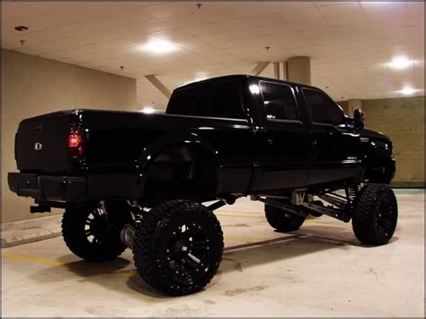 Pin By Trae Melton On Trucks Lifted Trucks Black Truck Trucks