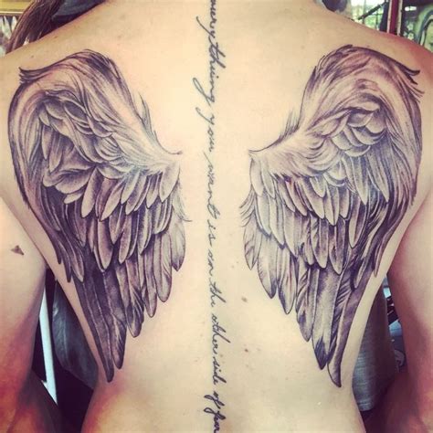 Beautiful Realistic Feathers Angel Wings Tattoo On Girl