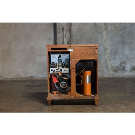 Malelivingspace is dedicated to places where men can live. Image of Vintage Mid-Century Magnavox Hi-Fi Stereo Cabinet