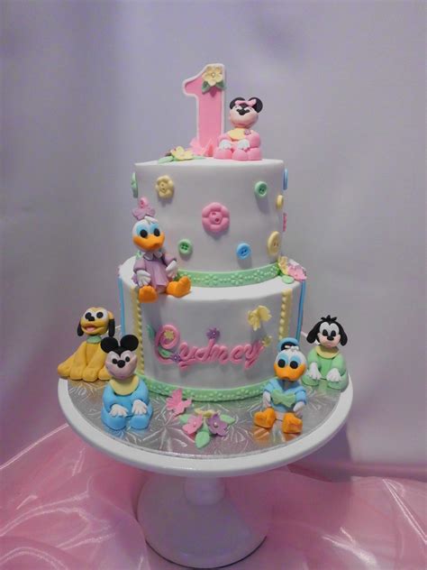 The place to get all your party supplies and party decorations. Disney Babies First Birthday Cake - CakeCentral.com