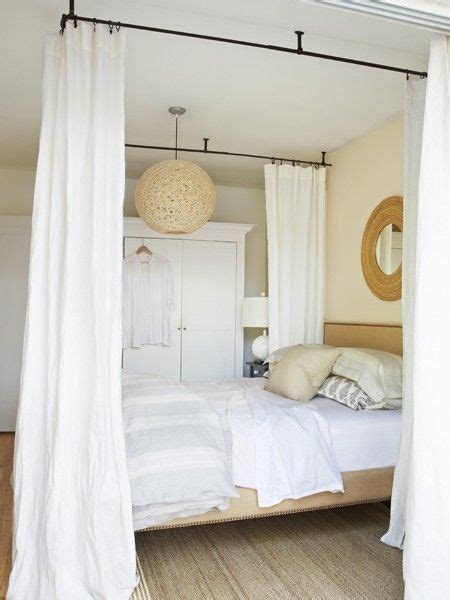 While a romantic, dramatic, or whimsical canopy bed can add excitement and flare to any bedroom, it be sure to put the curtain hooks onto the rods before you hang the rods. Ceiling curtain rods hung around the bed | Bedroom ...