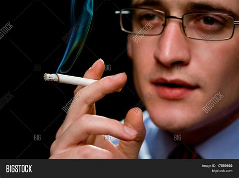 Man Holding Smoking Cigarette Over Image And Photo Bigstock