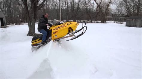 Snowmobile And A Snow Drift Youtube