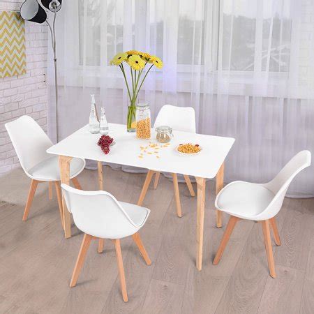 Pairing a rustic farmhouse table with modern chairs is a great way to add colour and personality to a traditionally formal space. Costway 5 Piece Mid-Century Dining Set Rectangular Table ...