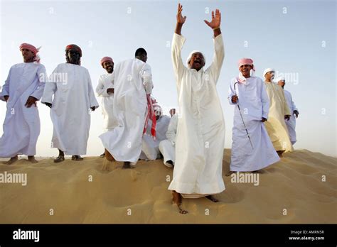 Group Of Arab Men In The Desert Stock Photo Alamy