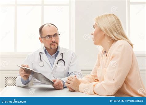 Doctor Consulting Woman In Hospital Stock Image Image Of Human