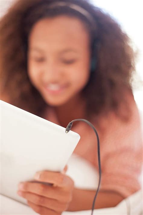 Teenage Girl Using A Tablet Computer Photograph By Ian Hootonscience