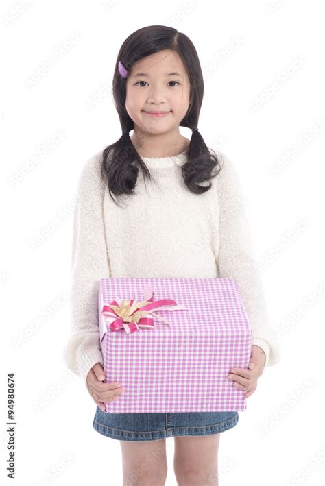 Cute Asian Girl Giving A Present Stock Foto Adobe Stock