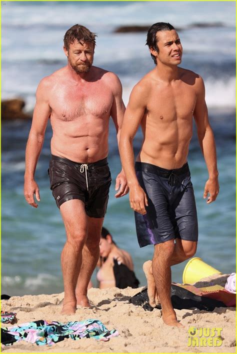 Simon Baker Goes Shirtless During Beach Day With 22 Year Old Son Claude See Photos Photo