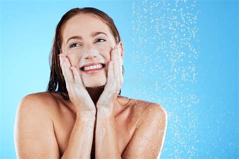 Shower Water And Face Of Happy Woman With Soap In Studio Blue