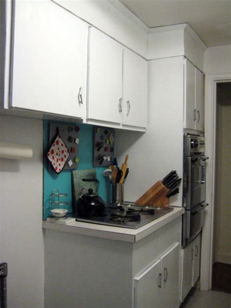 Then it is covered with a protective shield. How To Paint Plastic Laminate Kitchen Cabinets Kathleen's ...