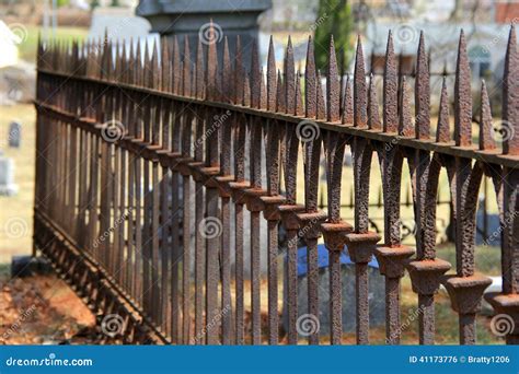 Long Line Of Rusty Spikes On Metal Fencing Stock Photo Image Of