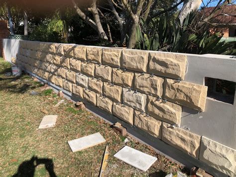 Turn Your Retaining Wall Into A Natural Looking Stone Cladded Wall