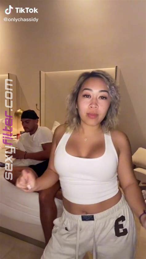 sexy chassidy shows cleavage in white tank top