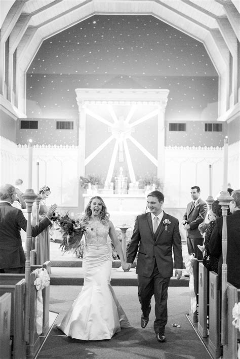 wedding at lake darling iowa wedding ceremony in catholic church black and white wedding