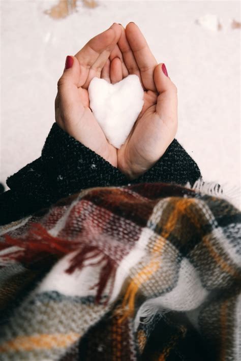 Hand Holding White Snow In Heart Shape Image Free Stock Photo