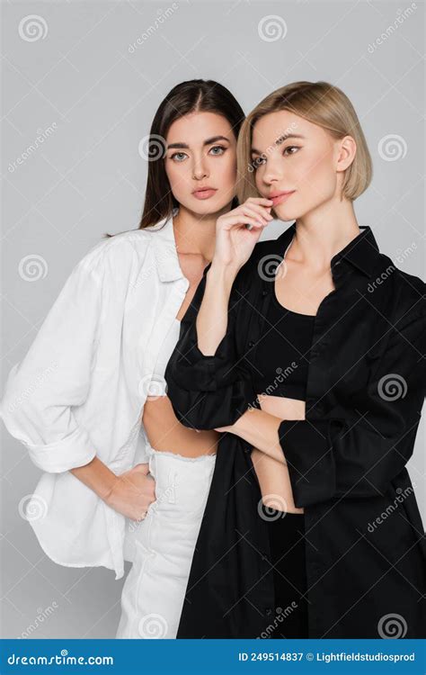 brunette and blonde woman posing in stock image image of style casual 249514837