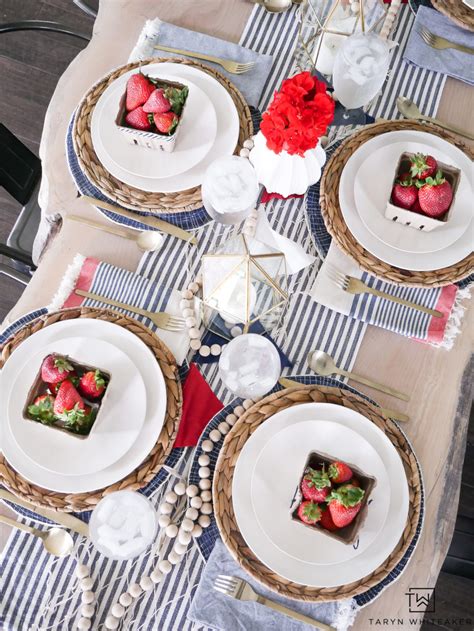 For the first table, i used a dragonfly napkin ring to hold the rolled up napkins. Coastal Fourth of July Table Decor - Taryn Whiteaker