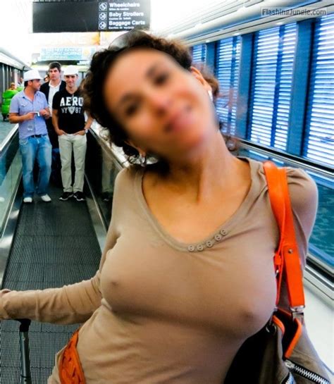 Braless And Horny At The Airport Boobs Flash Pics Pokies Pics Public