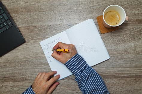 Male Hand Writing Text To Do Notebook As Drinks Coffee Stock Photos