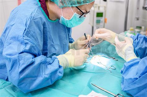 Female Surgeon In Operation Room Operating A Patient Stock Image Colourbox