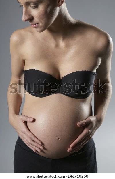 Midsection Happy Pregnant Woman Touching Belly Stock Photo Edit Now