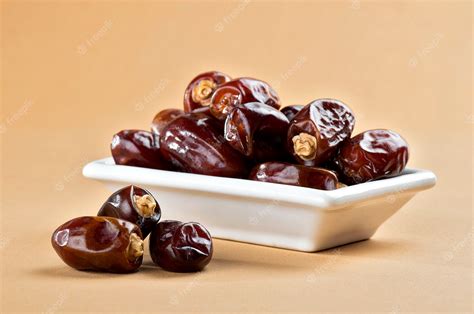 Premium Photo Dates In Plate Dried Dates Fruits