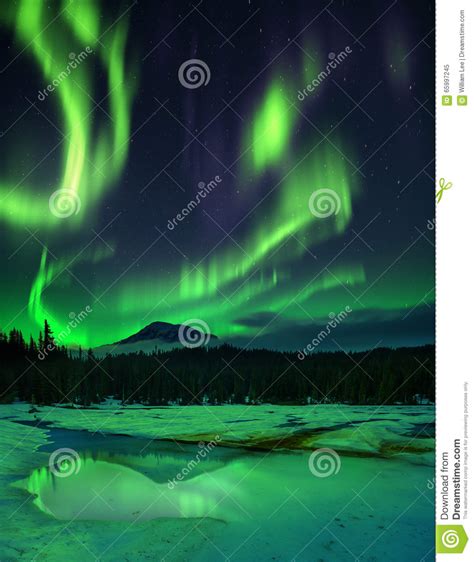 Aurora Borealis Over Frozen Lake Stock Image Image Of Color Mountain