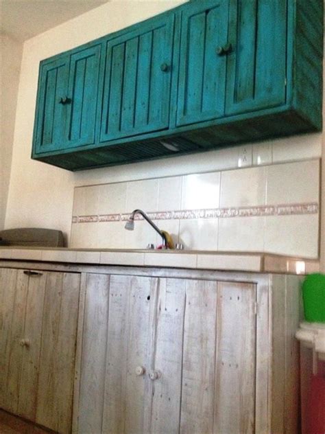 Although the contrast is subtle, it's just enough to anchor this airy. DIY Pallet Hanging Kitchen Cabinet | Hanging kitchen ...