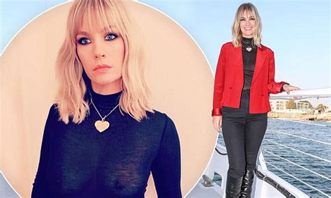 January Jones Flashes Perky Assets Through Sheer Jumper