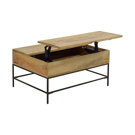 For us it was a west elm plank coffee table, with the price tag of $999. 47% OFF - West Elm West Elm Rustic Wood Coffee Table / Tables