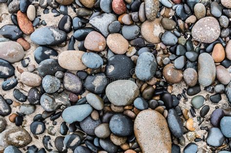 Multiple Stones On Beach In Carlsbad California Stock