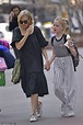 Naomi Watts looks windswept as she walks her son Samuel home from ...