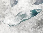 Satellite photos show how nearly all of Lake Erie became ice covered ...