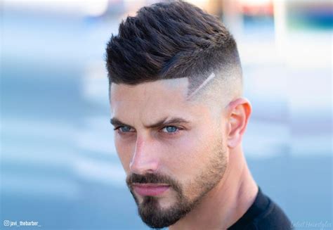 In 2020, men's hairstyles take on all forms and shapes which is a great thing because previously, if what's popular is a style that doesn't suit you (be it your face shape or head shape) you kind of feel left out. 15 Best Faux Hawk Fade Haircuts for Men in 2020