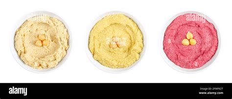 Hummus Dips In White Bowls Middle Eastern Dip A Spread Made Of Cooked Mashed Chickpeas