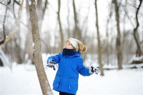 Little Boy Having Fun Playing With Fresh Snow Active Outdoors Leisure