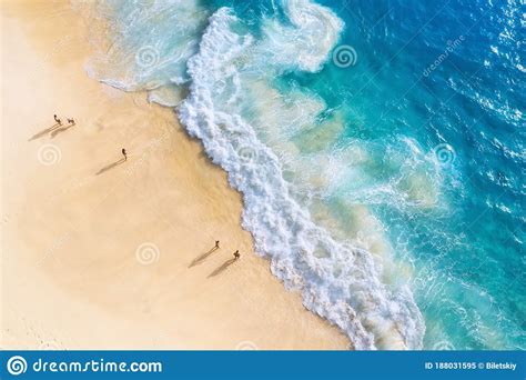 Beach People And Waves Coast As A Background From Top View Blue
