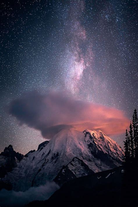 Download Snowy Mountain Peak On Starry Night Iphone Wallpaper
