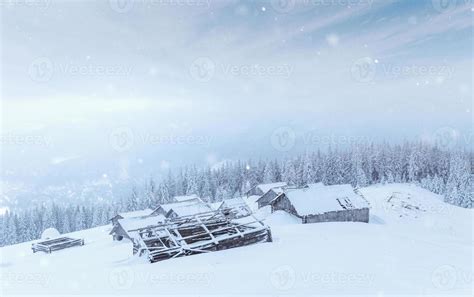 Cabin In The Mountains In Winter Mysterious Fog In Anticipation Of