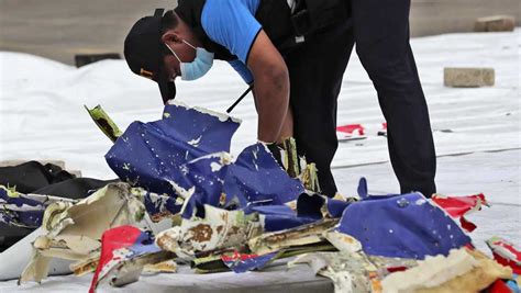 The plane's tail was recovered over the weekend, and its two black boxes — the flight data recorder and cockpit flight recorder — were retrieved on. Indonesian divers find parts of plane wreckage in Java Sea