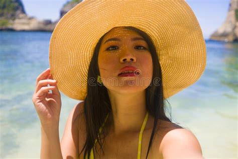 Portrait Of A Beautiful Asian Girl On Summer Vacation Stock Image