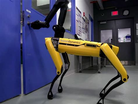 Boston Dynamics Robot Dog Opens Door And Holds It Open For Robot With
