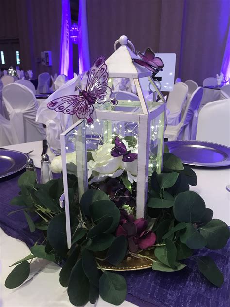 Butterflies In The Lilacs Lovely Garden Centrepieces For This Wedding
