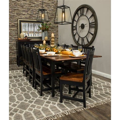 Brown rectangular counter height table, paired with charcoal gray chairs, set on a beige rug. Black and Brown Dining Room Table - Saber in 2020 | Brown ...