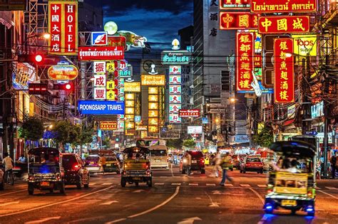 Neon Lights And Traffic On Yaowarat Road At Night In Chinatown Bangkok