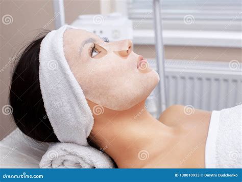 The Cosmetologist For Procedure Of Cleansing And Moisturizing The Skin